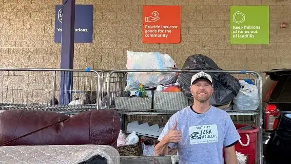 Jeremy dropping off a couch and mattress at a donation center