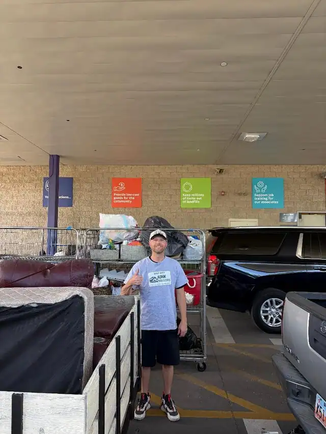 Jeremy dropping a couch and mattress at a donation center