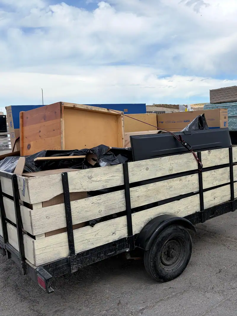 Loaded trailer and pickup at the transfer station